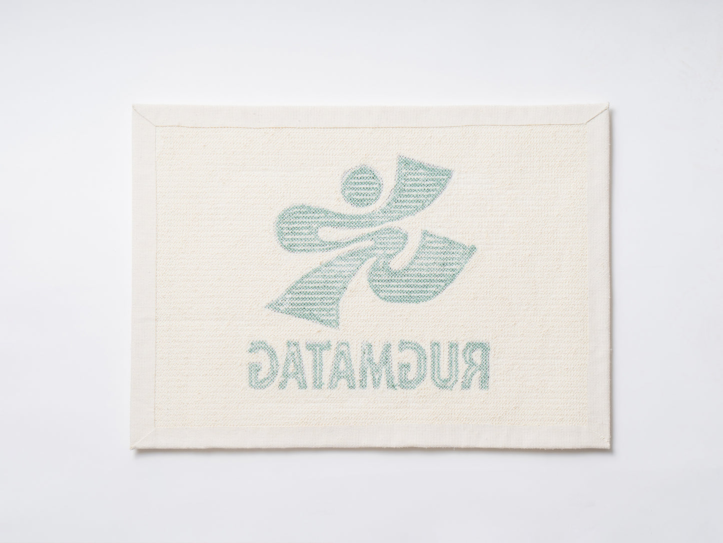 RUGMATAGロゴマットの裏面仕上げ